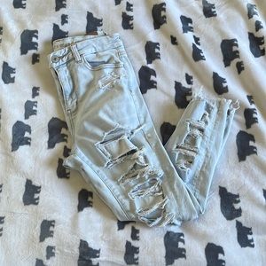 Super Stretch light wash distressed jeans